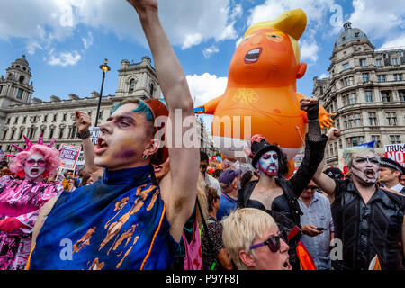 Anti Trump Protestors Carry An ‘Angry Baby’ Inflatable Blimp Mocking The President Through The Streets Of Central London, London, England Stock Photo