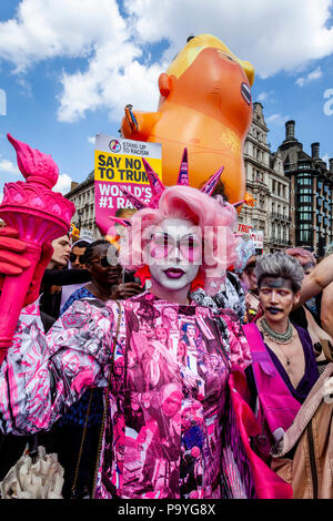 Anti Trump Protestors Carry An ‘Angry Baby’ Inflatable Blimp Mocking The President Through The Streets Of Central London, London, England Stock Photo