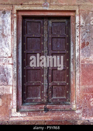 An old chained up doorway Stock Photo