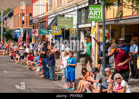 Spectators at annual Fourth of July Parade in the small mountain town of Salida; Colorado; USA Stock Photo