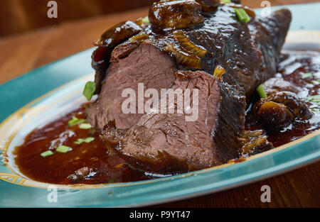 Slow Cooker Balsamic Glazed Roast Beef Stock Photo Alamy