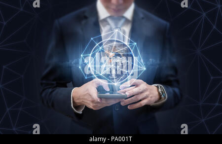 Businessman using mobile phone and global network technology. Element of this image are furnished by NASA Stock Photo