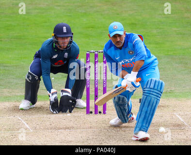 LEEDS, ENGLAND - JULY 17: MS Dhoni of India batting as wicketkeeper Jos Buttler of England looks on during the 3rd Royal London One day International match between England and India at Headingley Cricket Ground on July 17, 2018 in  England. Stock Photo
