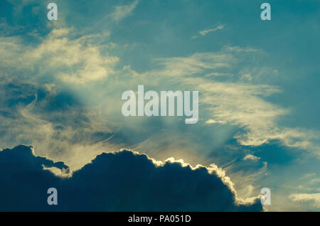 Dark blue grey layered clouds sky cover sun before raining. Stock Photo