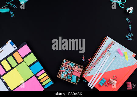 notebooks of pen for school on black background, place for text. copy space Stock Photo