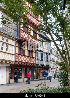 France Quimper Brittany old quarter.  Visitors enjoying stroll through pedestrianised Rue Kereon historic cobbled street. Quimper Brittany France Stock Photo