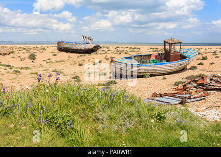Abandoned derelict fishing boats and gear on the foreshore of the shingle beach at Dungeness, Shepway district, Kent Stock Photo