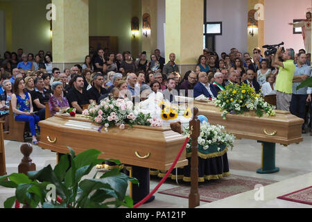 Rossano, Italy. 19th July, 2018. Rossano, the funeral of Stanislao Acri, a 35-year-old lawyer, his wife Daria Stella Olivo, aged 35, and their little 6-month-old Pier Antonio Acri, who died on 15 July in a terrible accident on the A1 near Frosinone. They were coming back from Rome on board their Fiat Punto and were hit by a van. Stanislao Acri had been nominated for mayor of Rossano for the Movimento 5 Stelle.19/07/2018, Rossano, Italy Credit: Independent Photo Agency Srl/Alamy Live News Stock Photo