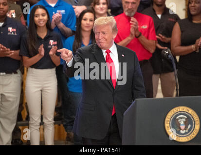 Washington DC, USA. 19th July, 2018. United States President Donald J. Trump makes remarks prior to signing an Executive Order establishing the National Council for the American Worker, which the Trump Administration calls 'an Interagency Council of Administration officials who will focus on crafting solutions to our country's urgent workforce issues' in the East Room of the White House in Washington, DC on Thursday, July 19, 2018. Credit: MediaPunch Inc/Alamy Live News Stock Photo