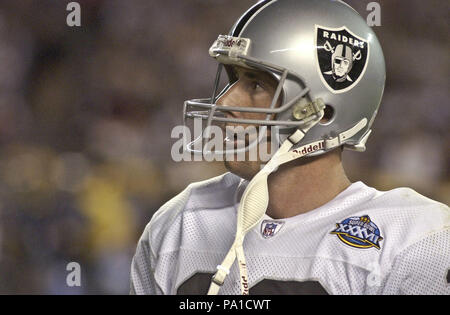 Jan 26, 2003 - San Diego, California, USA - Raiders quarterback RICH GANNON  walks off the field as confetti falls for the Tampa Bay Buccaneers after  the Raiders lost Super Bowl XXXVII