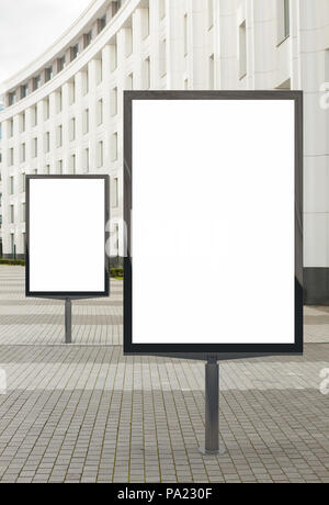 Two blank street billboard poster stands mock up on city business ...