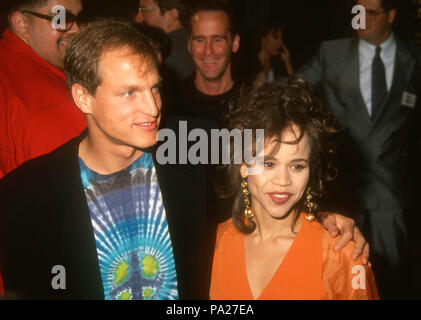 WESTWOOD, CA - MARCH 23: (L-R) Actor Woody Harrelson and actress Rosie Perez attend the Los Angeles Premiere of 'White Men Can't Jump' on March 23, 1992 at Avco Center Cinemas in Westwood, California. Photo by Barry King/Alamy Stock Photo Stock Photo