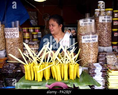 ANTIPOLO, RIZAL, PHILIPPINES - OCTOBER 21, 2015: Street food vendor sells snacks and other food items along a busy street in Antipolo City, Philippine Stock Photo