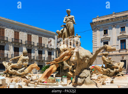 SYRACUSE, ITALY - JUNE 12, 2016: Diana fountain (installed by Giulio Moschetti  in 1907) on piazza Archimede. Beautiful travel photo of Sicily.