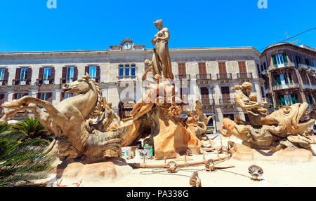 SYRACUSE, ITALY - JUNE 12, 2016: Diana fountain (installed by Giulio Moschetti  in 1907) on piazza Archimede. Beautiful travel photo of Sicily.