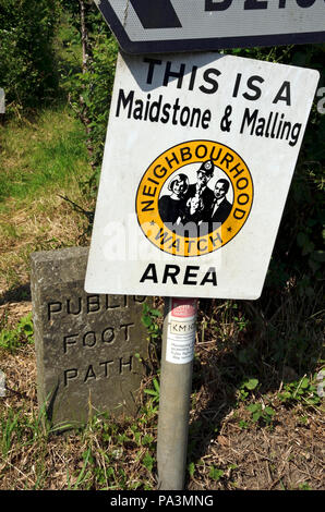 Neighbourhood Watch sign by a footpath and roadside in Boughton Monchelsea village, kent, England. Stock Photo