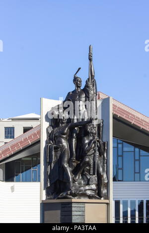 Wellington, New Zealand - June 4, 2016: The statue of Kupe, on the Wellington waterfront, shows the legendary explorer with his wife, Hine Te Aparangi Stock Photo