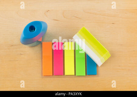 Color paper stickers and school writing instruments Stock Photo