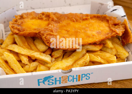 Fish and chips served at Tynemouth in England. The dish is traditional British meal. Stock Photo