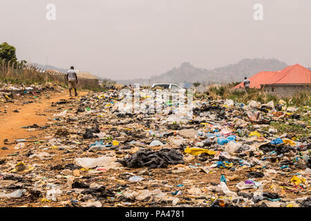 A pile of rubber bags wasteland causing pollution in the city Stock Photo