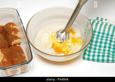 Tiramisu cake with kiwifruits. Step by step. Prepared dish: BJT4G5 Stock Photo