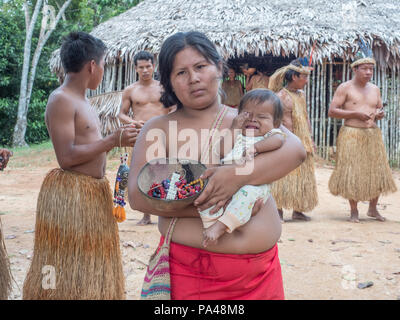Iquitos, Peru- Mar 28, 2018: Indian from Yagua tribe in his local costume Stock Photo