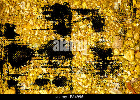 Ultra yellow Pebble surface, stone texture or rock backdrop, ground background. Stock Photo