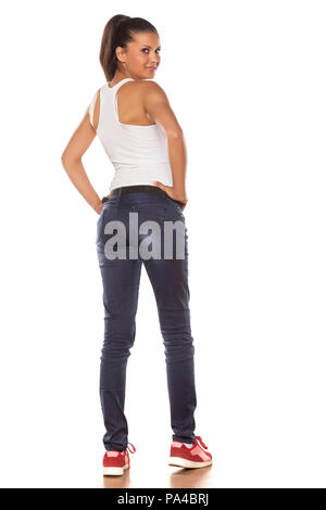 young cute latina in jeans from behind Stock Photo