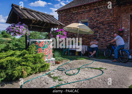 Farm in Zalipie village in Poland, known for its local tradition of floral paintings made famous by folk artist Felicja Curylowa Stock Photo