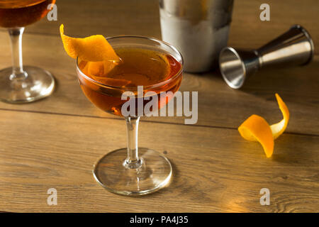 Alcoholic Martinez Cocktail with Gin Vermouth and Orange Peel Stock Photo