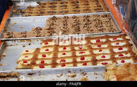 Arabic dessert made with custard, coconut and strawberry also known as The Queen's Honey Stock Photo