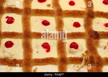 Arabic dessert made with custard, coconut and strawberry also known as The Queen's Honey Stock Photo