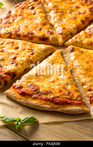 Homemade Greasy New York Cheese Pizza Ready to Eat Stock Photo