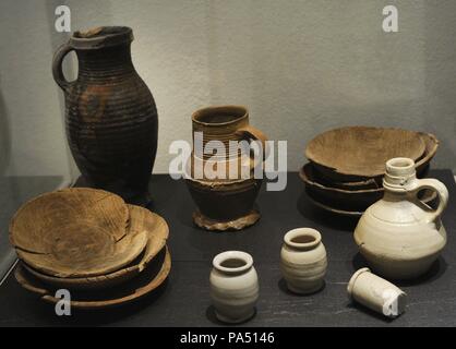 Middle Ages. Group of ceramic objects (jugs, cups, plates, etc.) belonging to a Beguine Community. Stolkgasse. 13th century. Roman-Germanic Museum. Cologne. Germany. Stock Photo