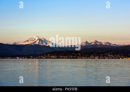 Sunset at Mt. Baker across Bellingham Bay, Bellingham, Washington, Pacific Northwest, USA. Stock Photo