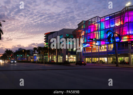 TD Bank, lit up at dawn with multicoloured lights, Collins Avenue, Miami Beach Stock Photo