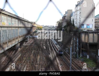 Outlooking of Paris railway from a bridge, still in usage by many of trains and other railway vehicles. Stock Photo