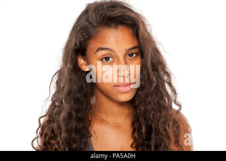 beautiful dark skinned girl with distrustful look Stock Photo