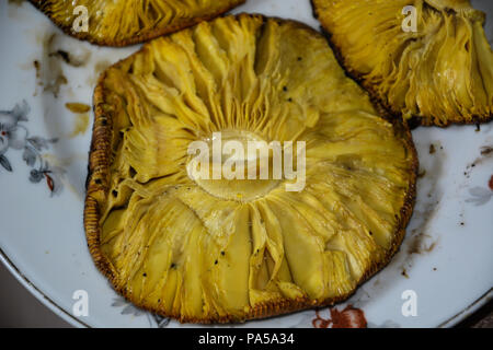 Caesar's mushroom (Amanita caesarea). Most delicious mushroom in the world. Mushroom only grilled on her top and lots of salt back. Stock Photo