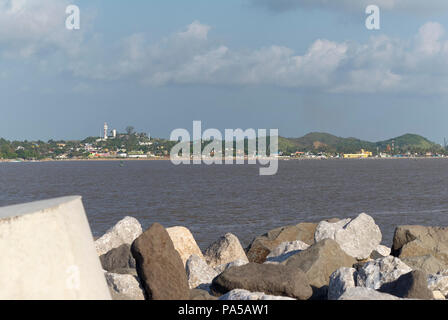 COATZACOALCOS VER/MEXICO - JULY 18, 2018: View of Allende, the old 'Lucio Gallardo' lighthouse and the maritime control tower. Smoke from burning dump Stock Photo