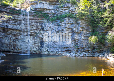 Girl taking a dip in Awosting Falls during Summer Time Minnewaska State Park Preserve NY Stock Photo