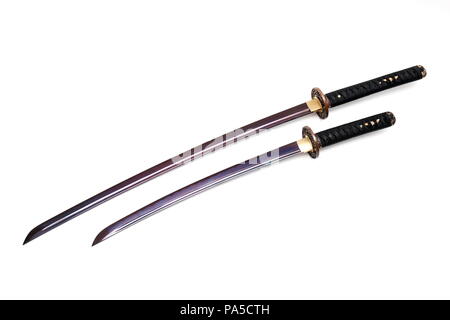Katana and wakizashi Japanese swords isolated in white background. Stock Photo
