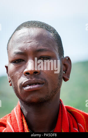 AMBOSELI, KENYA - OCTOBER 10, 2009: Portait of an unidentified Massai man in Kenya, Oct 10, 2009. Massai people are a Nilotic ethnic group Stock Photo