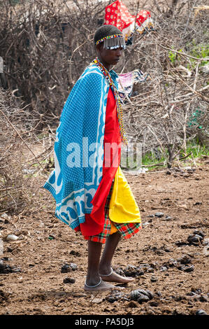 KENYA - OCTOBER 10, 2009: Unidentified Massai woman wearing tribal typical clothes in Kenya, Oct 10, 2009. Massai people are a Nilotic ethnic group Stock Photo