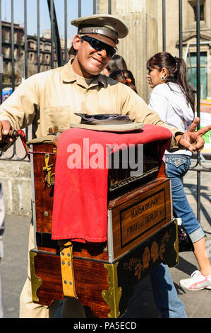MEXICO CITY, MEXICO - DEC 29, 2011: Unidentified Mexican musician in the street. 60% of Mexican people belong to the Mestizo ethnic group Stock Photo