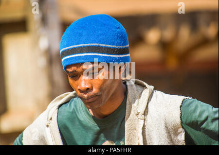 MADAGASCAR - JUNE 30, 2011: Portrait of an unidentified Madagascar market seller in Madagascar, June 30, 2011. People of Madagascar suffer of poverty  Stock Photo