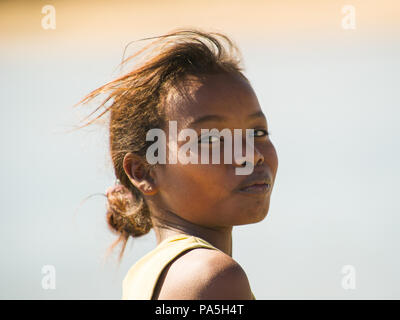 MADAGASCAR - JULY 5, 2011: Portrait of an unidentified beautiful girl in Madagascar, July 5, 2011. Children of Madagascar suffer of poverty due to the Stock Photo