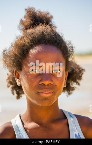 MADAGASCAR - JULY 5, 2011: Portrait of an unidentified girl in Madagascar, July 5, 2011. Children of Madagascar suffer of poverty due to the unstable  Stock Photo