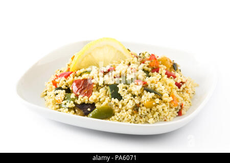 Couscous with vegetables isolated on white background. Stock Photo