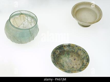 Corrugated shell, from Cologne; Bowl of Millefiori, probably from Rhineland and glass container, unknown origin. Roman-Germanic Museum. Cologne. Germany. Stock Photo